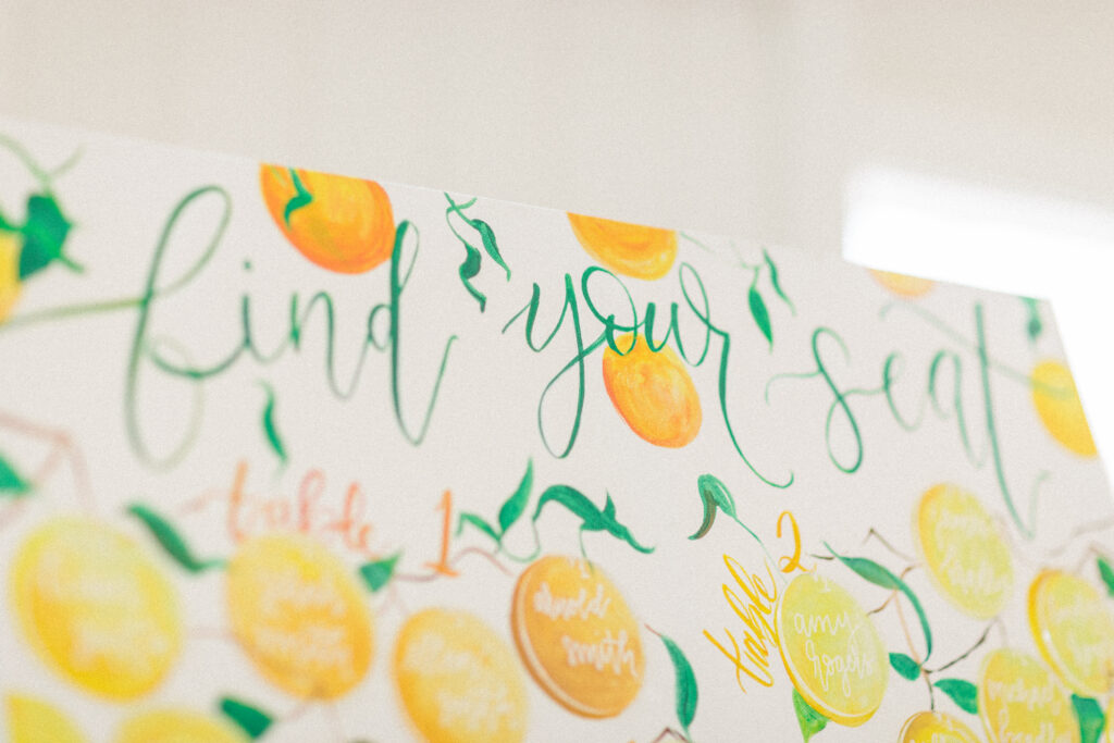 citrus wedding invitations - custom watercolor wedding stationery with a monogram crest and pink lemonade twist! By Ashley triggiano - as featured on style me pretty