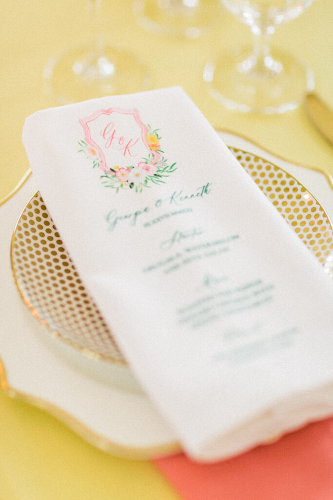 citrus wedding menu napkin - custom watercolor wedding stationery with a monogram crest and pink lemonade twist! By Ashley triggiano - as featured on style me pretty