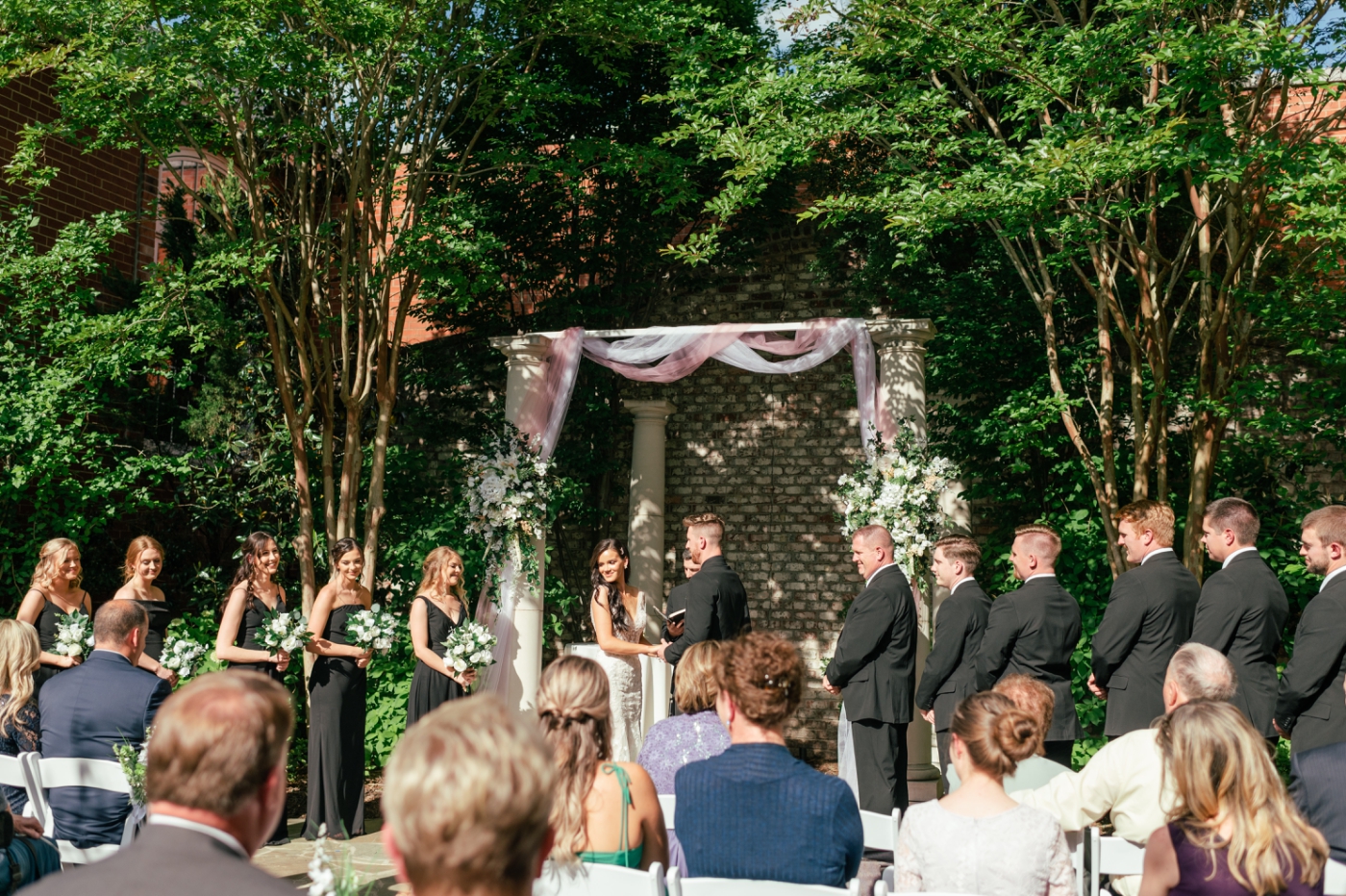 Outdoor wedding ceremony at Revolution Mill in Greensboro