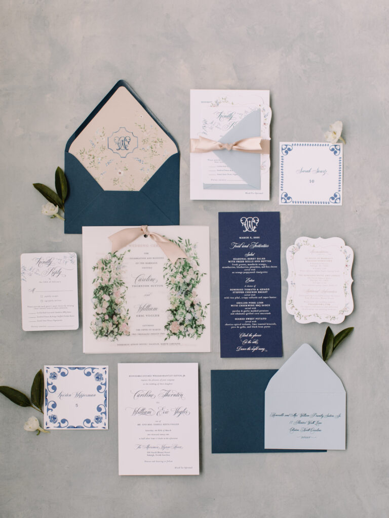 blue and white grandmillenial invitation suite flat lay
