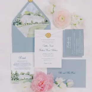 barn of chapel hill spring wedding invitation suite flat lay