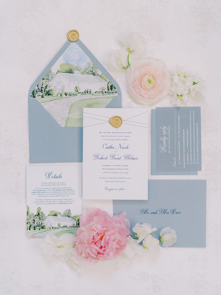 barn of chapel hill spring wedding invitation suite flat lay