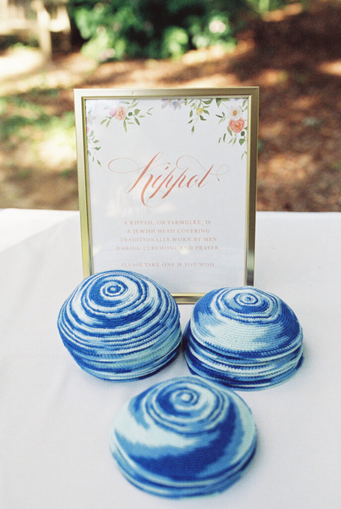 kippot sign with blue kippahs for a wedding