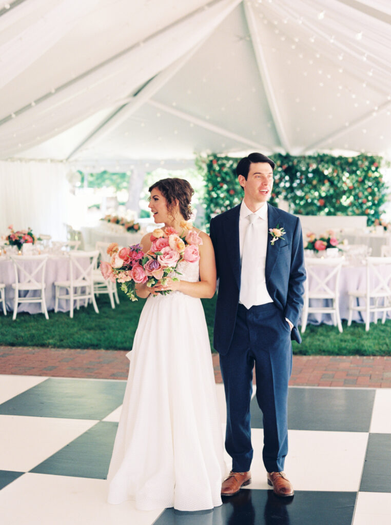 bride and groom seeing their reception space for the first time at their chapel hill wedding