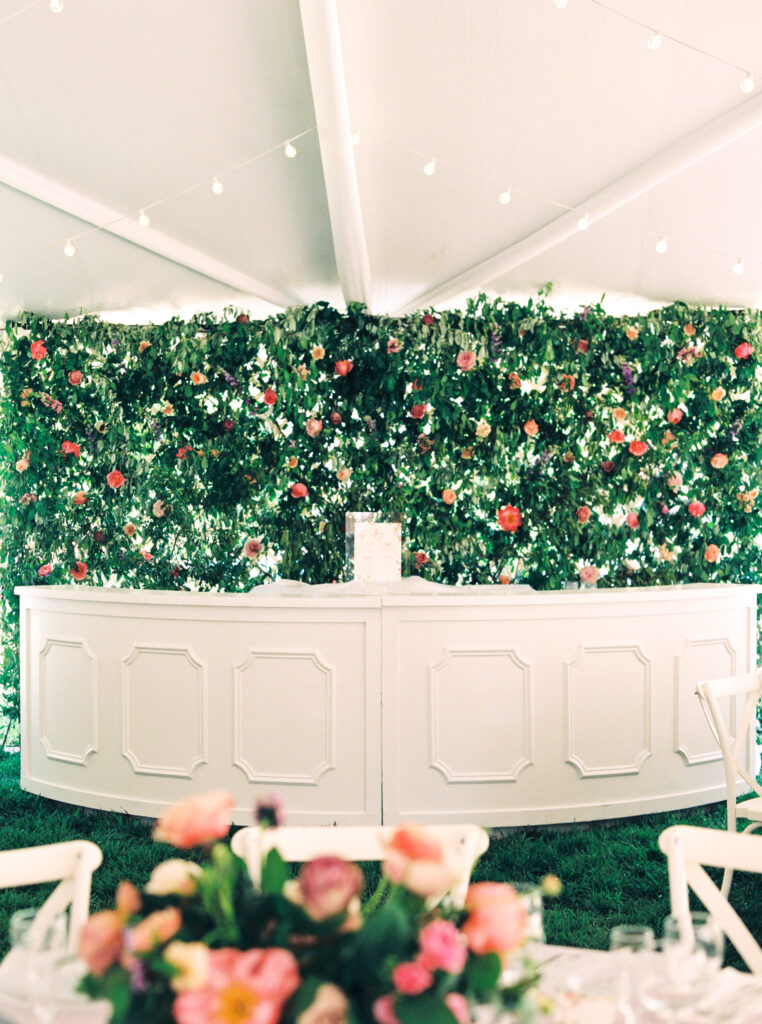 curved bar with floral backdrop