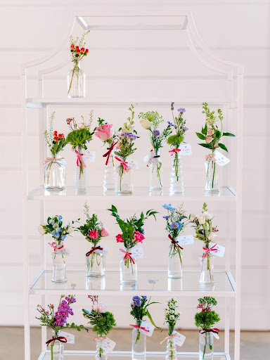 bud vase seating chart at wedding