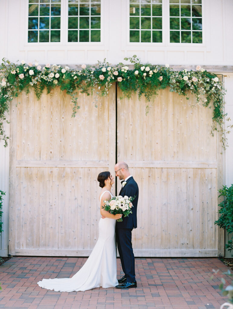 bride and groom portrait barn of chapel hill