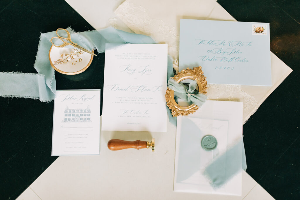 dainty blue and white invitation suite for Carolina Inn wedding