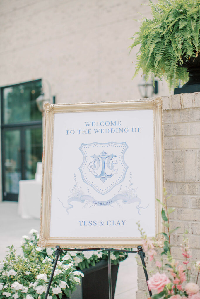 blue and white wedding welcome sign