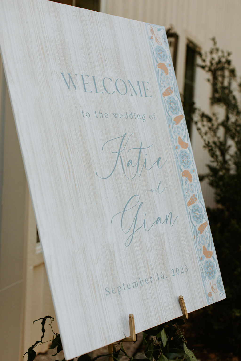 welcome sign for blue and terracotta wedding