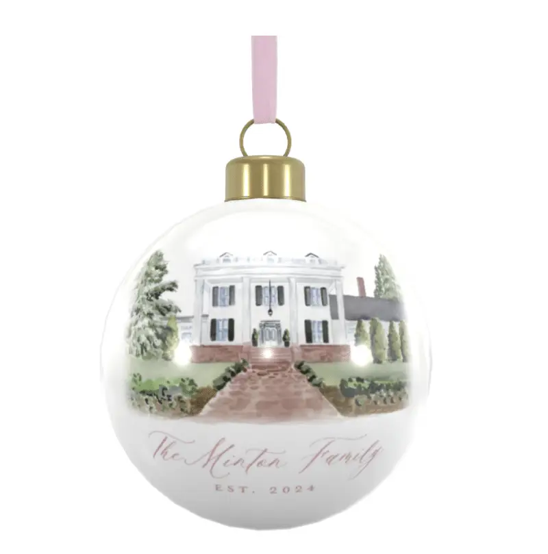 a white round Christmas ornament made of bone china and featuring a watercolor illustration of rose hill estate in North Carolina for weddings